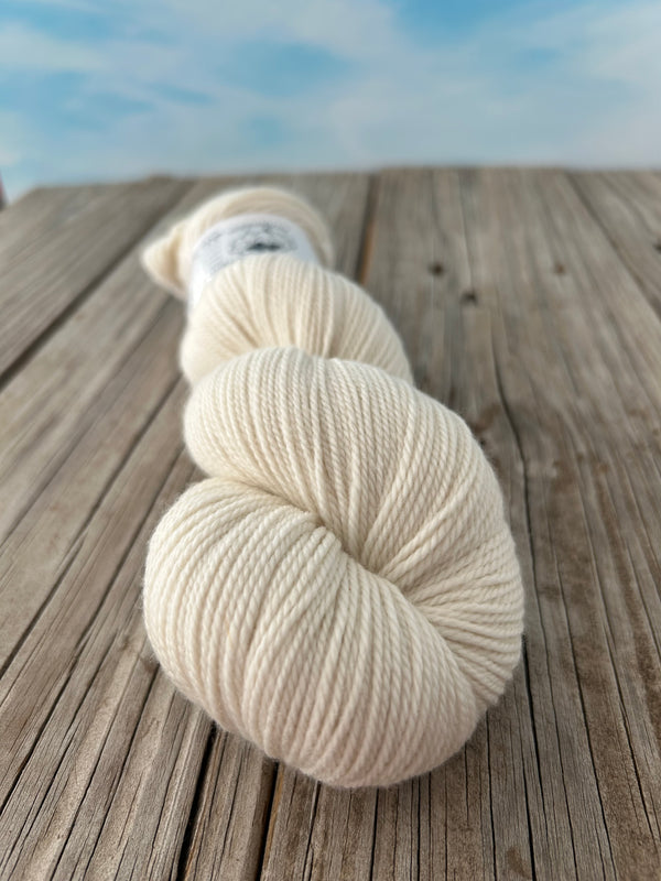 White Sand Beaches, Organic Merino Sport Treasures Yarn, cream ecru undyed natural yarn