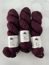 Song of the Sirens, Treasured Yak Toes Sock Yarn, magenta wine yarn