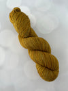 Tarnished Brass, Treasured Yak Toes Sock Yarn, goldenrod yellow yarn