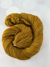 Tarnished Brass, Treasured Yak Toes Sock Yarn, goldenrod yellow yarn