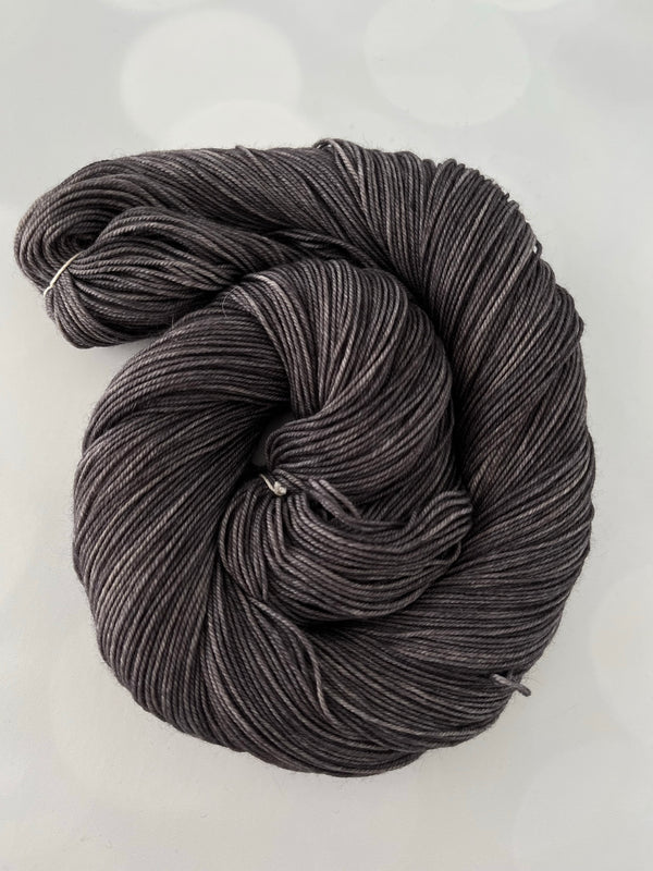 Gunpowder, Treasured Yak Toes Sock Yarn, dark charcoal gray yarn