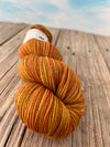 Scallywag, Organic Merino Sport Treasures Yarn, yellow orange harvest yarn