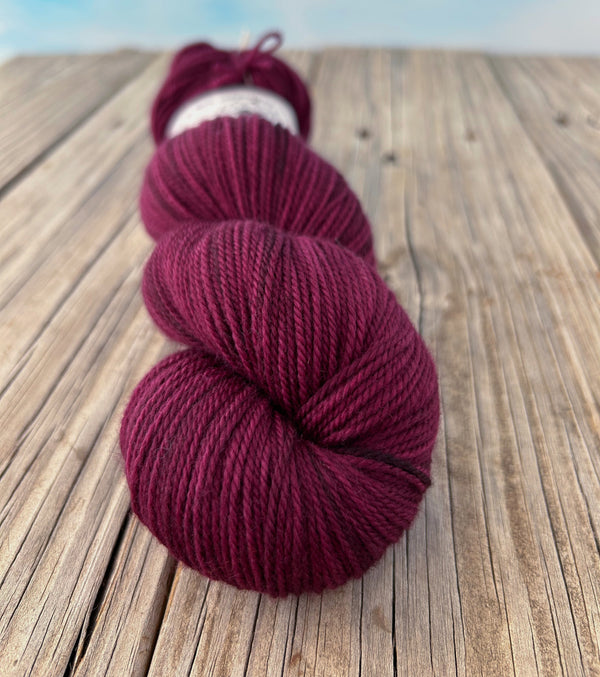 Song of the Sirens, Organic Merino Sport Treasures Yarn, wine magenta yarn